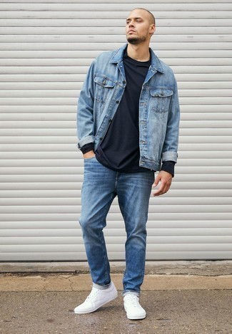 Navy Long Sleeve T-Shirt Outfits For Men: For a laid-back and cool getup, dress in a navy long sleeve t-shirt and blue jeans — these pieces fit perfectly well together. When not sure about the footwear, add a pair of white canvas low top sneakers to this look.