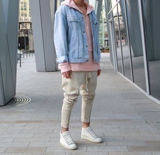 White Leather High Top Sneakers Outfits For Men: Indisputable proof that a light blue denim jacket and beige chinos look awesome when paired together in a relaxed casual getup. Our favorite of a myriad of ways to finish this look is with white leather high top sneakers.