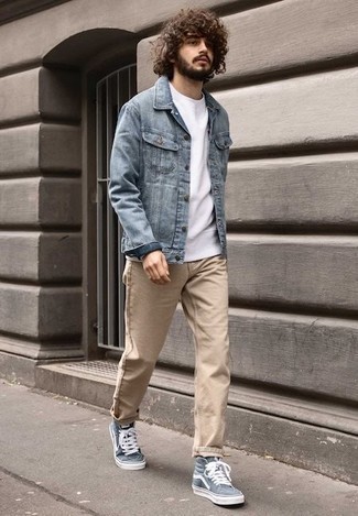 khaki jacket with blue jeans