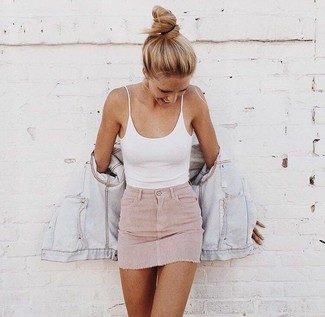 Pink Mini Skirt Outfits: Consider teaming a light blue denim jacket with a pink mini skirt for a relaxed casual look with a modern spin.