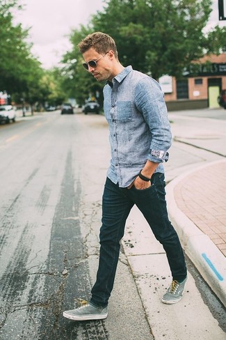 Light Blue Denim Shirt with Navy Skinny Jeans Summer Outfits For Men: A light blue denim shirt and navy skinny jeans are a modern casual pairing that every modern gentleman should have in his off-duty styling lineup. A pair of grey plimsolls easily kicks up the style factor of this getup. Super cool and entirely summer-friendly, you can work this getup all season long.