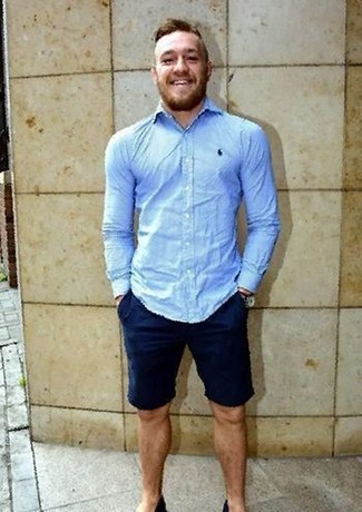 Such items as a light blue dress shirt and navy shorts are an easy way to introduce a dose of masculine sophistication into your current casual lineup.