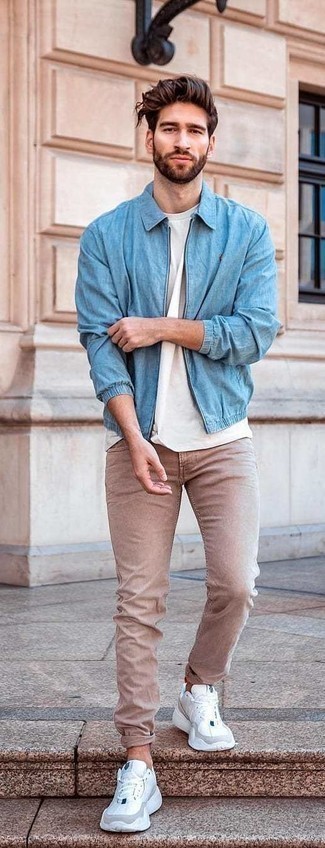 Light Blue Harrington Jacket Outfits: This pairing of a light blue harrington jacket and khaki jeans looks put together and instantly makes any gentleman look cool. White athletic shoes will add a casual aesthetic to the look.
