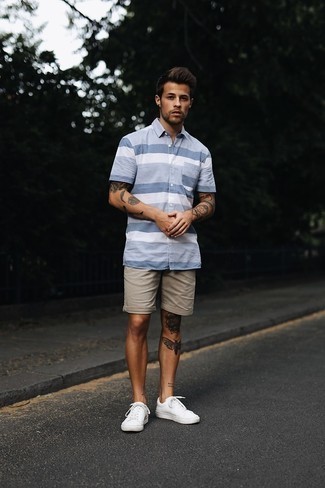 Light Blue Horizontal Striped Short Sleeve Shirt Outfits For Men: A light blue horizontal striped short sleeve shirt and beige shorts make for the perfect foundation for a laid-back and cool ensemble. Complement this look with a pair of white canvas low top sneakers for maximum effect.