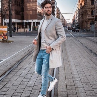 Men's White and Black Canvas Low Top Sneakers, Light Blue Ripped Jeans, Beige Turtleneck, Grey Overcoat