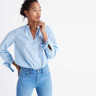 Light Blue Skinny Jeans Outfits: If the situation permits a relaxed outfit, choose a light blue long sleeve blouse and light blue skinny jeans.