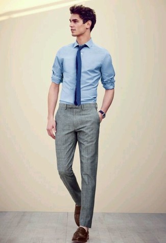 Blue Tie Outfits For Men: To look like a modern gent at all times, try pairing a light blue long sleeve shirt with a blue tie. This outfit is rounded off perfectly with a pair of dark brown leather loafers.