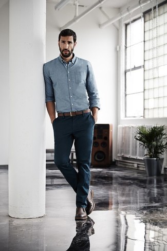 Light Blue Chambray Long Sleeve Shirt Outfits For Men: Try teaming a light blue chambray long sleeve shirt with navy chinos to feel fully confident and look laid-back and cool. If not sure as to the footwear, stick to dark brown leather desert boots.