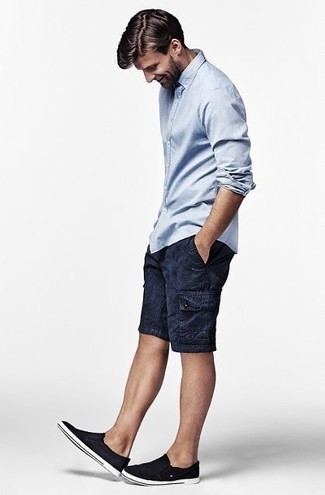 Black and White Canvas Slip-on Sneakers Outfits For Men: A light blue long sleeve shirt and navy shorts? This is an easy-to-wear getup that you can work on a daily basis. All you need is a nice pair of black and white canvas slip-on sneakers to finish this getup.
