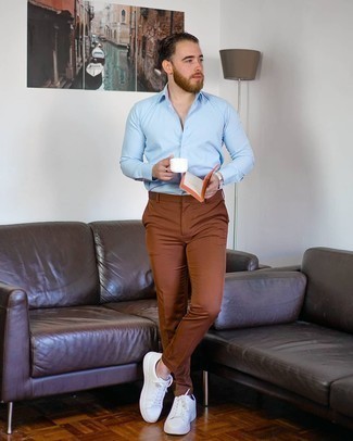Brown Chinos Summer Outfits: You can look casual and cool without really trying by opting for a light blue long sleeve shirt and brown chinos. Loosen things up and complement your ensemble with a pair of white canvas low top sneakers. This combination has all the potential to become your warm weather favorite.