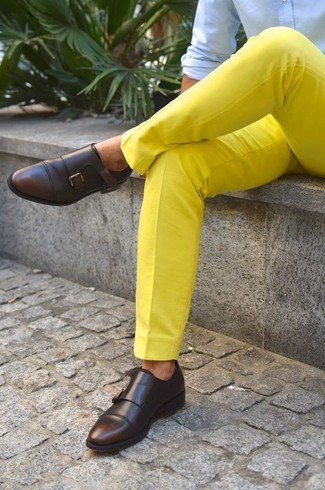 Mustard Dress Pants Outfits For Men: Pairing a light blue long sleeve shirt and mustard dress pants is a fail-safe way to inject a refined touch into your wardrobe. We're totally digging how a pair of dark brown leather double monks makes this ensemble complete.