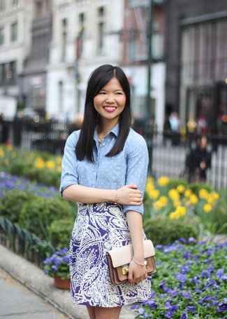 Violet Print Mini Skirt Outfits: For a neat and relaxed ensemble, consider wearing a light blue polka dot dress shirt and a violet print mini skirt — these items fit perfectly well together.