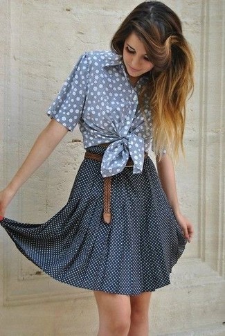Light Blue Short Sleeve Button Down Shirt Outfits For Women: A light blue short sleeve button down shirt and a navy and white polka dot skater skirt are essential in a great casual arsenal.