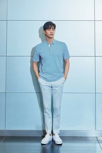 Light Blue Polo Outfits For Men: A light blue polo and light blue chinos are must-have menswear pieces, without which no wardrobe would be complete. The whole getup comes together if you introduce white canvas low top sneakers to the mix.