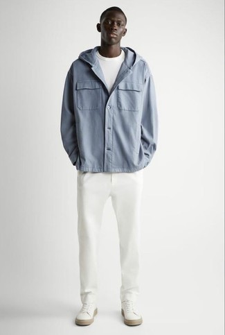 Light Blue Shirt Jacket Outfits For Men: This pairing of a light blue shirt jacket and white chinos is a safe bet when you need to look on-trend in a flash. Let your styling skills truly shine by complementing this outfit with a pair of white canvas low top sneakers.