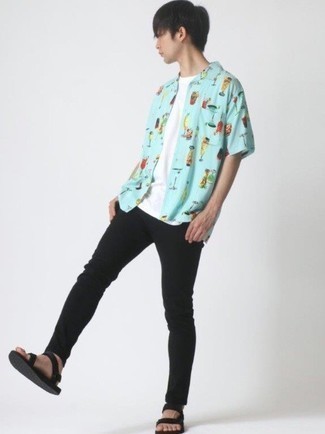 Black Canvas Sandals Outfits For Men: Rushed mornings require a simple yet cool and casual look, such as a light blue print short sleeve shirt and black skinny jeans. Feeling creative? Dress down this outfit by rounding off with a pair of black canvas sandals.