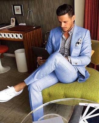 Choose a light blue suit and a blue print long sleeve shirt and you will definitely make ladies swoon. Want to break out of the mold? Then why not introduce a pair of white plimsolls to the mix?