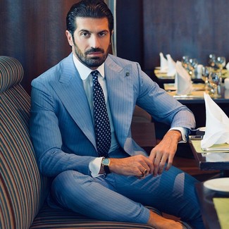 Light Blue Suit Outfits: This combo of a light blue suit and a white dress shirt can only be described as ridiculously stylish and sophisticated.