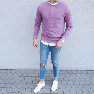 White Low Top Sneakers Outfits For Men: When the situation allows an off-duty getup, consider pairing a light violet crew-neck sweater with light blue ripped skinny jeans. And if you need to easily dress up your ensemble with footwear, complement this outfit with white low top sneakers.