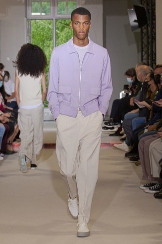 500+ Spring Outfits For Men: A light violet harrington jacket and beige chinos are the perfect foundation for a cool and casual look. Rounding off with white canvas low top sneakers is the simplest way to add a little edge to your outfit. So when spring is here, you'll find this look to be your everything.