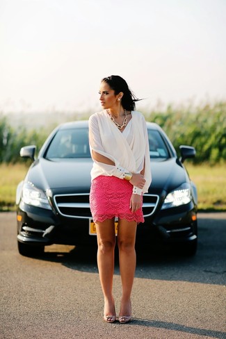 Hot Pink Leather Pumps Outfits: If you're on the lookout for a casual but also incredibly stylish getup, pair a white long sleeve blouse with a hot pink lace mini skirt. For a more refined twist, introduce hot pink leather pumps to your ensemble.