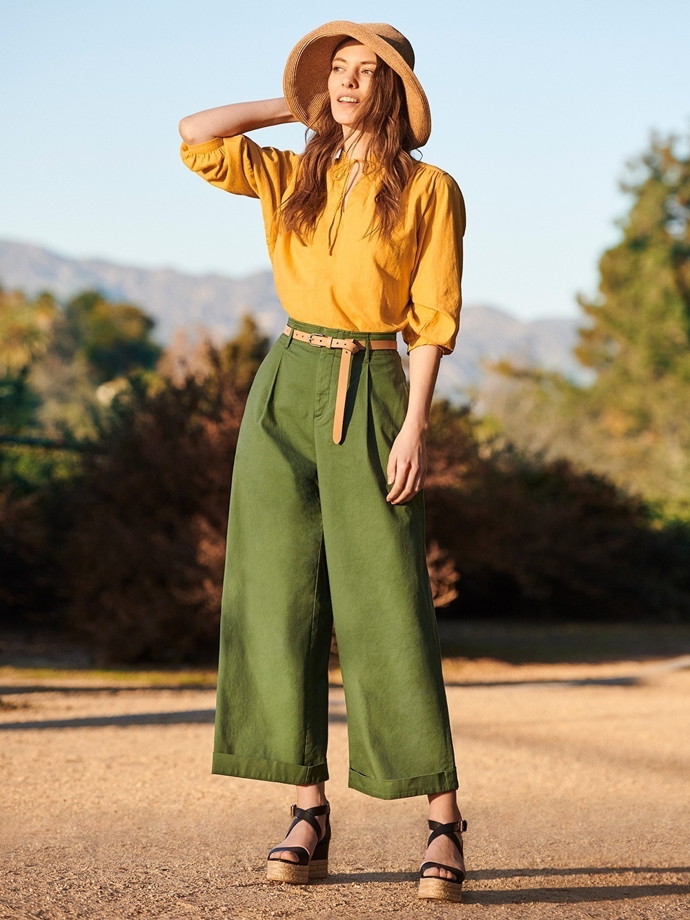 Women's Mustard Long Sleeve Blouse, Dark Green Wide Leg Pants, Black  Leather Wedge Sandals, Khaki Straw Hat