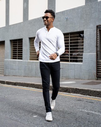 Black Jeans Outfits For Men: A white long sleeve henley shirt and black jeans are the perfect base for a variety of dapper looks. Add white canvas high top sneakers to this look to make a mostly classic ensemble feel suddenly fun and fresh.