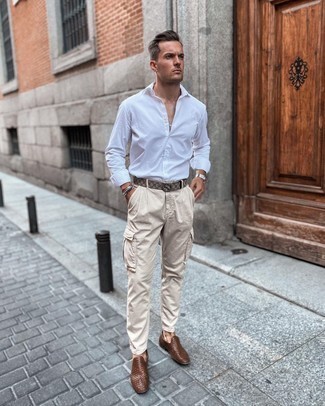 Beige Cargo Pants Outfits: This combo of a white long sleeve shirt and beige cargo pants is proof that a safe off-duty ensemble doesn't have to be boring. You could perhaps get a bit experimental on the shoe front and lift up this ensemble by finishing with a pair of brown woven leather loafers.