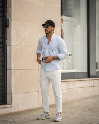 White Chinos Outfits: Exhibit your prowess in menswear styling by pairing a light blue vertical striped long sleeve shirt and white chinos for a laid-back getup. Introduce a pair of grey athletic shoes to the equation to make a standard outfit feel suddenly fun and fresh.