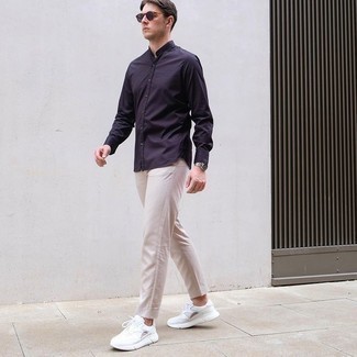 Navy Long Sleeve Shirt Outfits For Men: Consider teaming a navy long sleeve shirt with beige chinos for a casual kind of class. Bring a more laid-back twist to by rocking a pair of white athletic shoes.