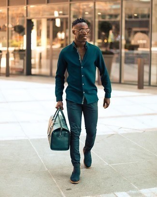 Navy Leather Holdall Outfits For Men: Showcase your credentials in menswear styling in this casual street style pairing of a navy long sleeve shirt and a navy leather holdall. Finishing off with a pair of navy suede chelsea boots is a guaranteed way to introduce a bit of fanciness to this outfit.