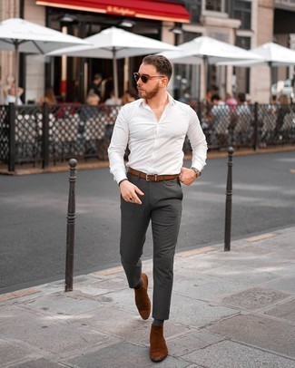 Brown Belt Outfits For Men: Why not dress in a white long sleeve shirt and a brown belt? As well as super functional, these pieces look awesome teamed together. For a more polished touch, why not add a pair of brown suede chelsea boots to your look?
