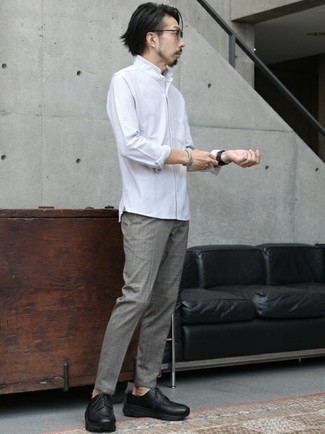Black Chunky Leather Derby Shoes Outfits: You'll be surprised at how super easy it is for any man to throw together this off-duty getup. Just a white long sleeve shirt paired with grey chinos. Why not complement this ensemble with black chunky leather derby shoes for an added touch of style?