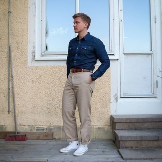 Men's Navy Chambray Long Sleeve Shirt, Grey Chinos, White Canvas High Top Sneakers, Dark Brown Leather Belt