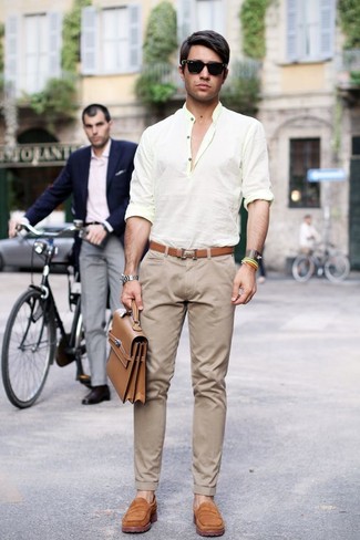 Dark Brown Leather Belt Hot Weather Outfits For Men: Try pairing a yellow linen long sleeve shirt with a dark brown leather belt to create an off-duty and stylish look. Introduce tan suede loafers to the equation for an instant dressy look.
