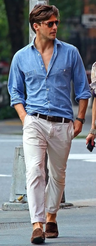 Men's Light Blue Chambray Long Sleeve Shirt, White Chinos, Brown Suede Loafers, Dark Brown Leather Belt