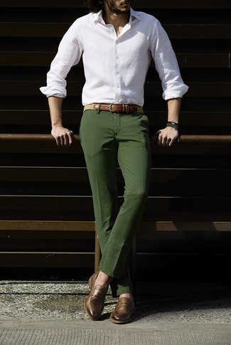 Dark Green Pants with White Shirt Hot Weather Outfits For Men: For an on-trend look without the need to sacrifice on functionality, we love this pairing of a white shirt and dark green pants. For a smarter finish, complement this getup with a pair of brown leather loafers.