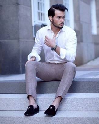 Black Velvet Loafers Outfits For Men: Why not marry a white long sleeve shirt with beige chinos? These two pieces are totally practical and look awesome worn together. Let your styling credentials truly shine by rounding off your ensemble with a pair of black velvet loafers.