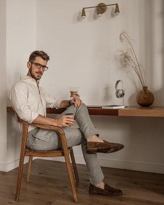 Beige Vertical Striped Long Sleeve Shirt Outfits For Men: Choose a beige vertical striped long sleeve shirt and grey chinos for both dapper and easy-to-achieve look. Balance out your getup with a sleeker kind of footwear, such as this pair of brown suede loafers.