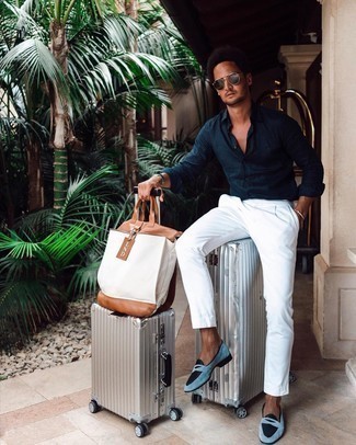 Silver Suitcase Outfits For Men: A navy long sleeve shirt and a silver suitcase worn together are a perfect match. A pair of light blue suede loafers can easily level up any outfit.