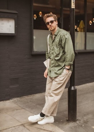 Dark Brown Sunglasses Outfits For Men: No matter where you go over the course of the day, you'll be stylishly ready in this casual combo of an olive long sleeve shirt and dark brown sunglasses. Add a pair of white canvas low top sneakers to the mix for a dose of class.