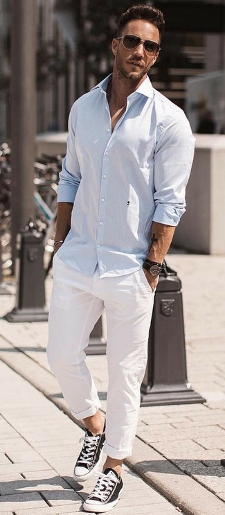 Men's Light Blue Long Sleeve Shirt, White Chinos, Black and White Canvas Low Top Sneakers, Dark Brown Sunglasses
