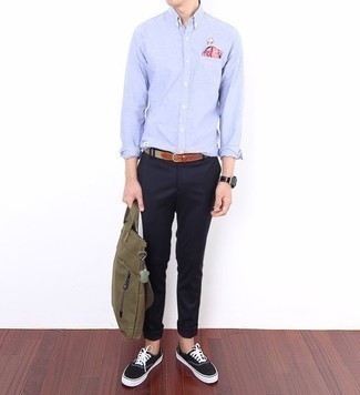 Light Blue Linen Long Sleeve Shirt Outfits For Men: Dress in a light blue linen long sleeve shirt and navy chinos for a casual outfit with a modern take. Transform your getup with black and white canvas low top sneakers.