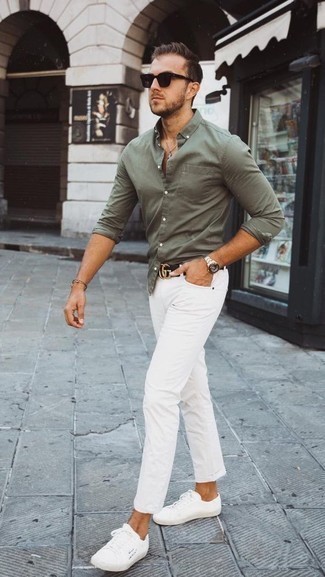 Black Embellished Leather Belt Outfits For Men: An olive long sleeve shirt and a black embellished leather belt are a good ensemble worth having in your day-to-day rotation. Want to go all out when it comes to shoes? Introduce white canvas low top sneakers to the equation.