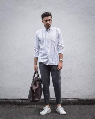 Men's White Vertical Striped Long Sleeve Shirt, Charcoal Chinos, White Canvas Low Top Sneakers, Dark Brown Leather Tote Bag