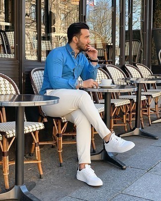Men's Blue Chambray Long Sleeve Shirt, White Chinos, White Canvas Low Top Sneakers, Black Leather Watch