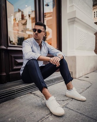 Men's White and Blue Vertical Striped Long Sleeve Shirt, Navy Chinos, White Canvas Low Top Sneakers, Black Sunglasses
