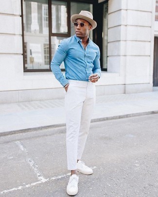 Beige Beaded Bracelet Outfits For Men: Look cool without really trying by wearing a light blue chambray long sleeve shirt and a beige beaded bracelet. Make a bit more effort with footwear and add a pair of white canvas low top sneakers to the mix.