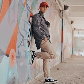 Mustard Baseball Cap Outfits For Men: A huge thumbs up to this edgy combination of a white and black gingham long sleeve shirt and a mustard baseball cap! And if you need to easily spruce up your outfit with a pair of shoes, why not go for black and white canvas low top sneakers?