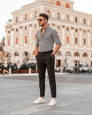 White and Black Gingham Long Sleeve Shirt Outfits For Men: If you like casual style, why not pair a white and black gingham long sleeve shirt with dark brown chinos? Complete this outfit with white leather low top sneakers and you're all set looking awesome.